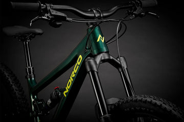 26 Norco Fluid FS 24" - Dark Metallic Green